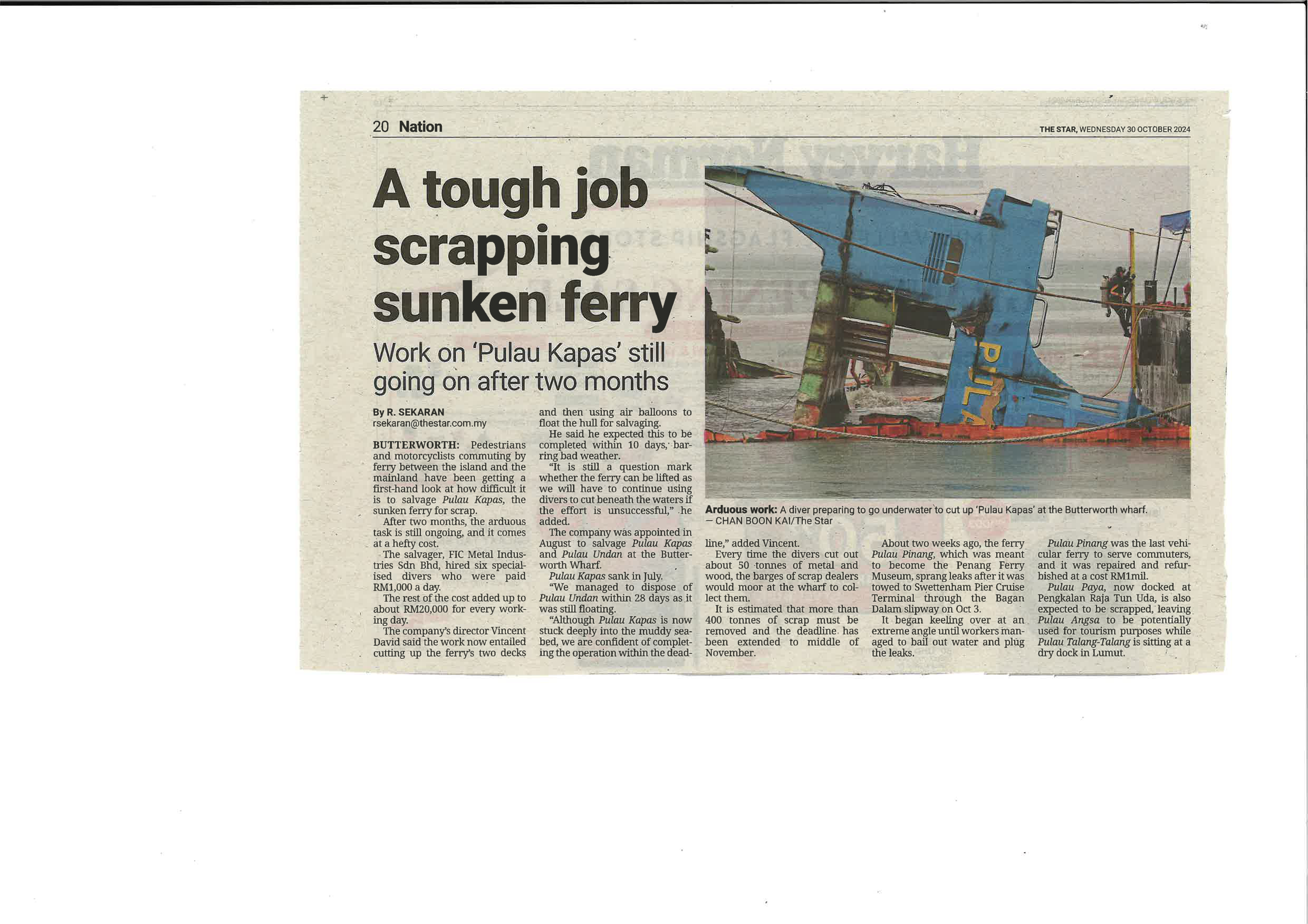 A Tough Job Scrapping Sunken Ferry